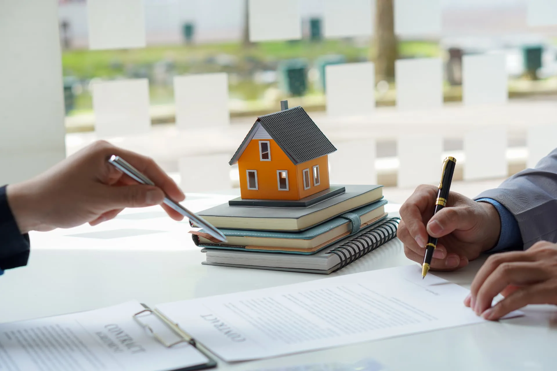 Model house and contract signing - first-time buyer mortgage guides