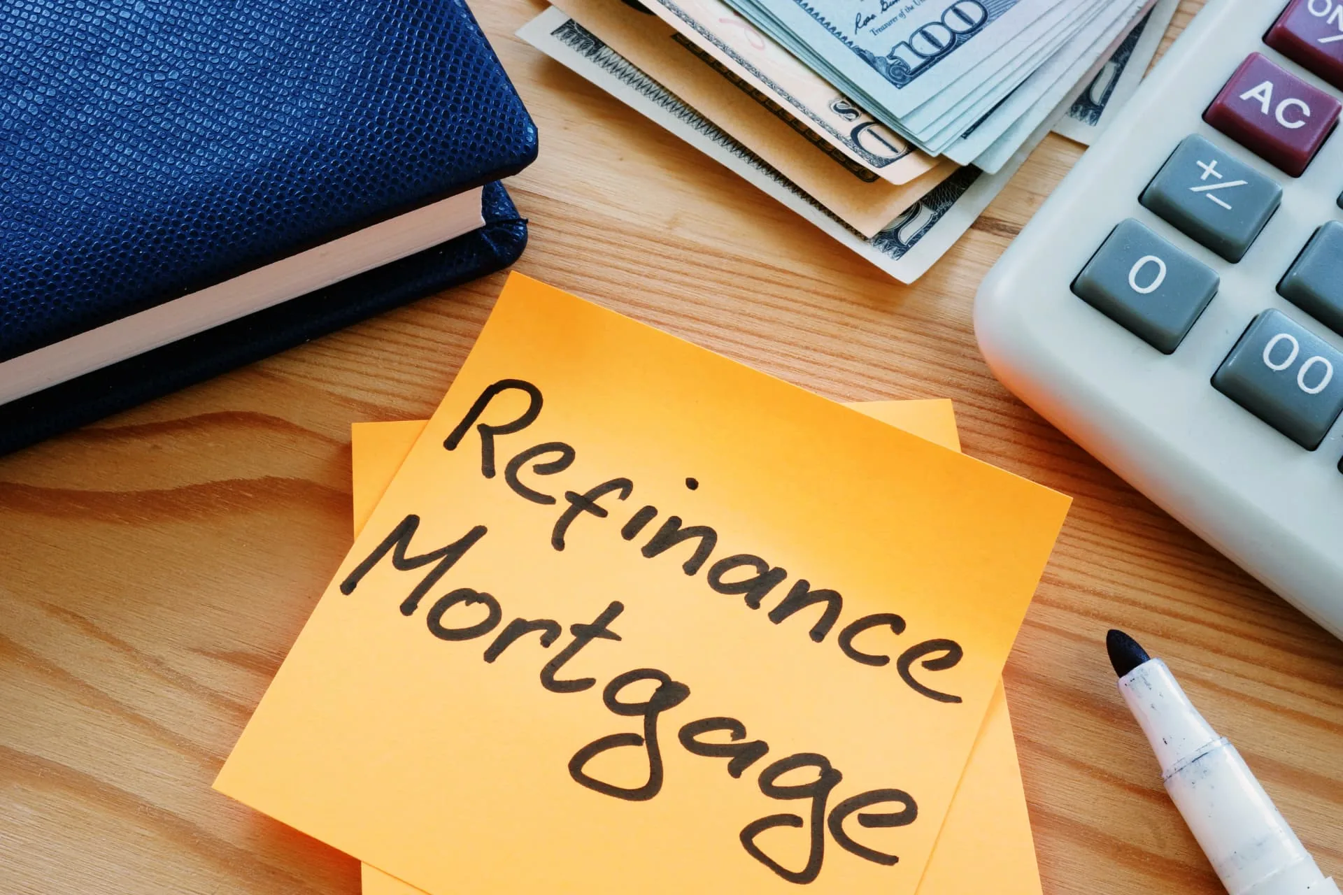 Refinance paperwork on a desk - refinance mortgage guides